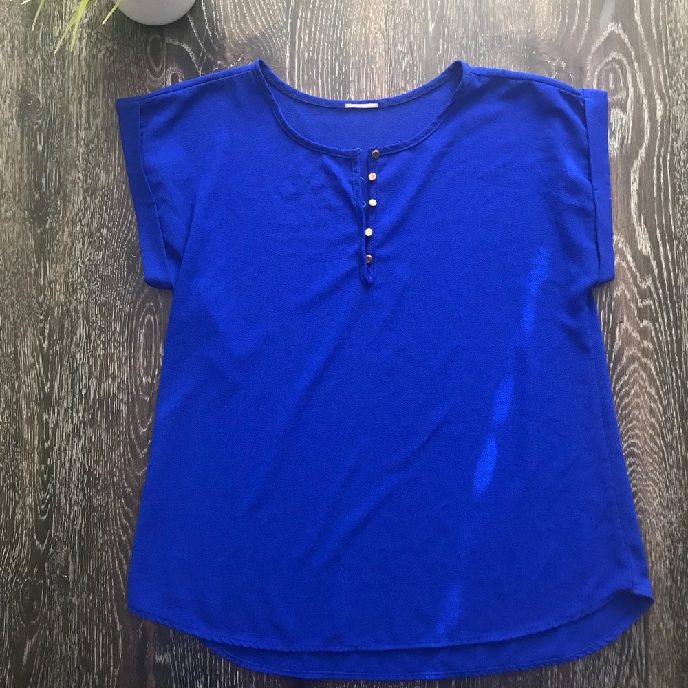 Royal blue blouse with gold buttons